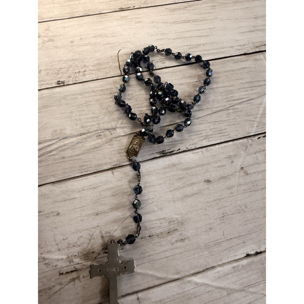 A vintage blue glass bead rosary with a silver-toned metal crucifix and medal. - Picture 6 of 10
